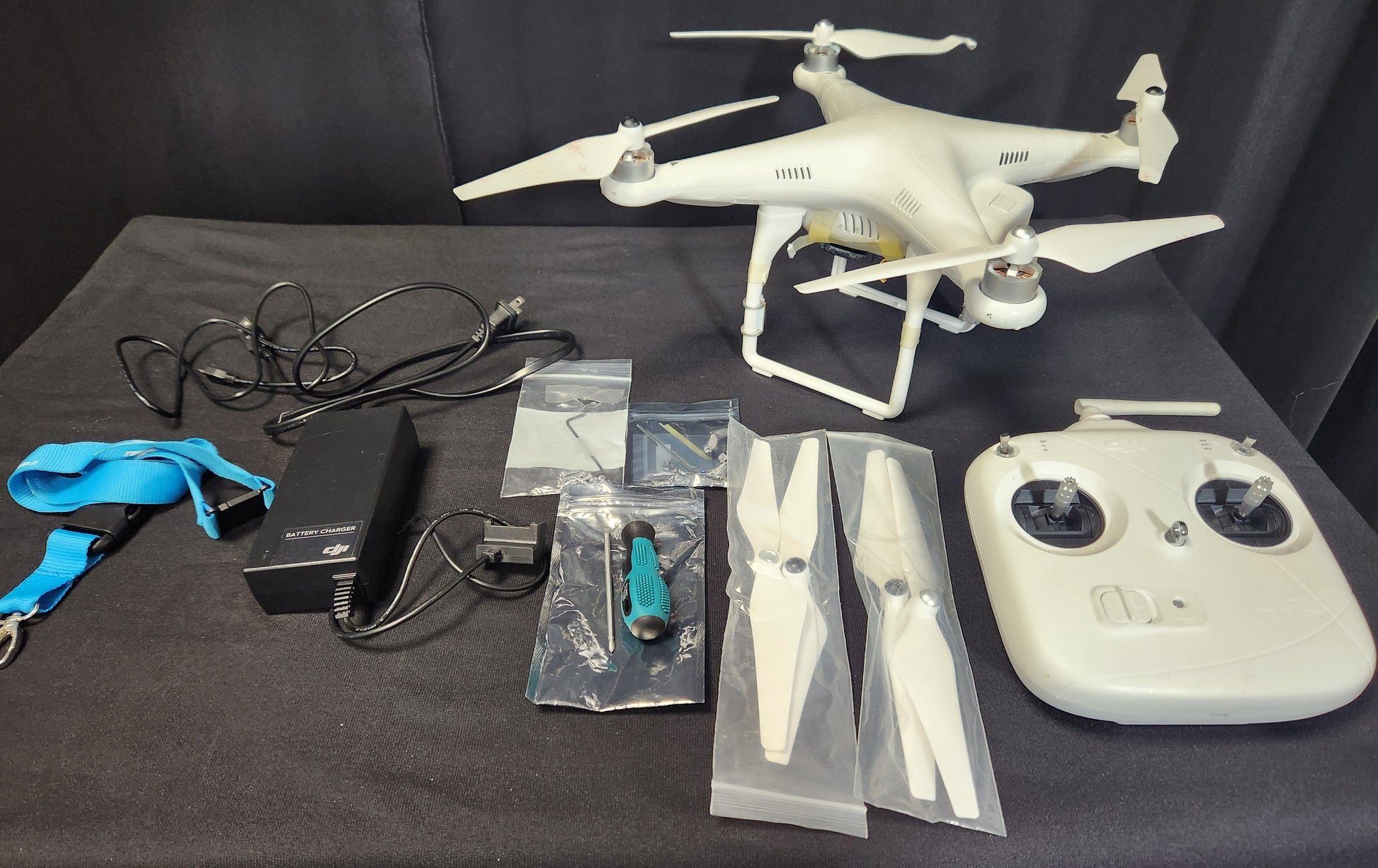 Used DJI Phantom Drone (P330Z) + DJ6 Controller, tools & spare props - HD Source